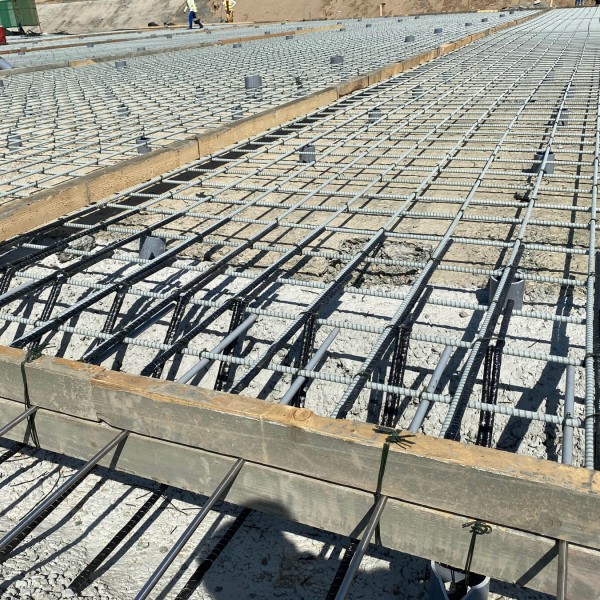 Close-up view of fiberglass rebar on a job site