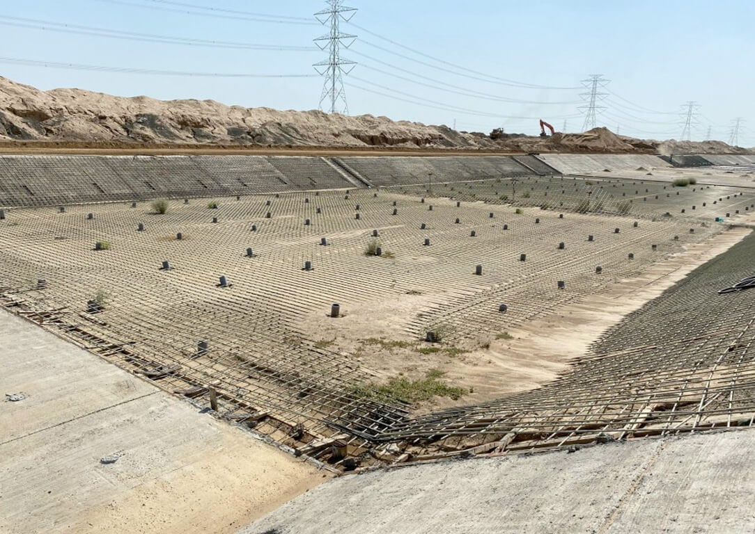 A wide view of a large project on dirt using fiberglass rebar