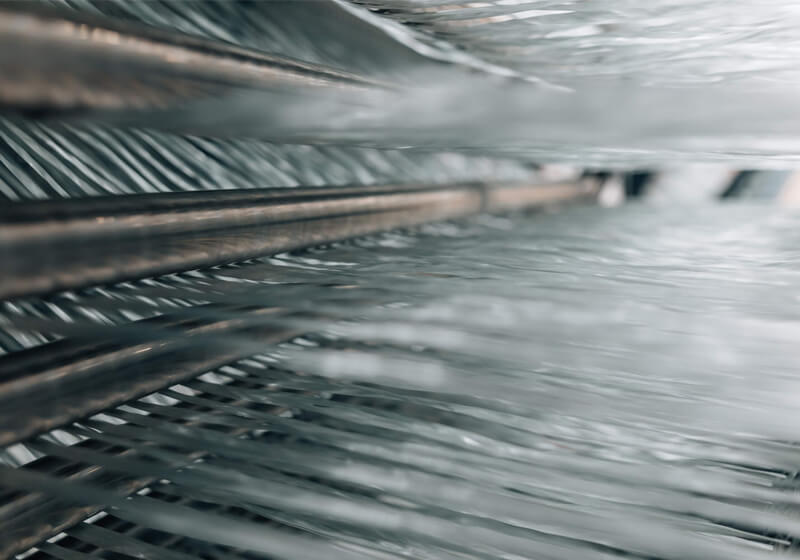 Close-up of fiberglass rebar being made in a production facility